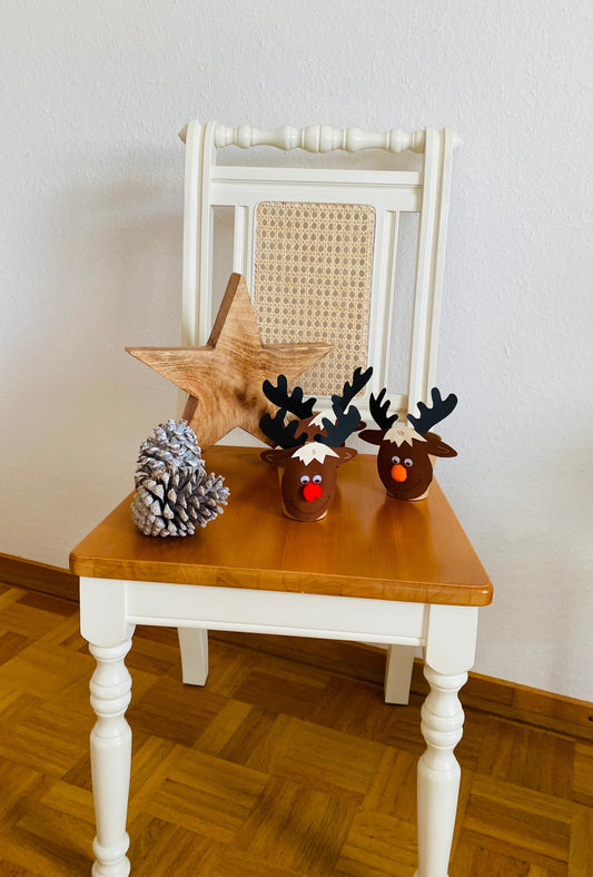 Adventskalender: 24 Elche mit Becher